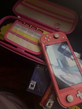 Pink Nintendo Switch Lite 4 game bundle with case
